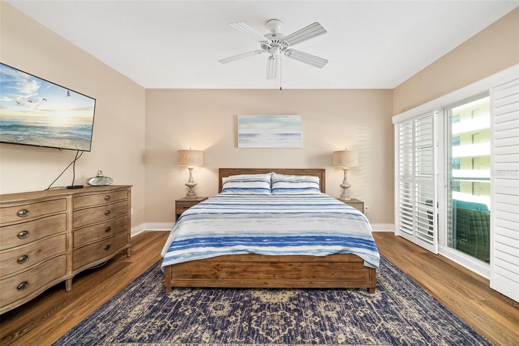 6512 Midnight Pass Road, Unit 204 Sarasota, FL 34242 - Photo 21 of 64 a bedroom with a bed and window