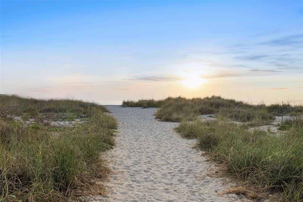 6512 Midnight Pass Road, Unit 204 Sarasota, FL 34242 - Photo 55 of 64 a view of lake with mountain