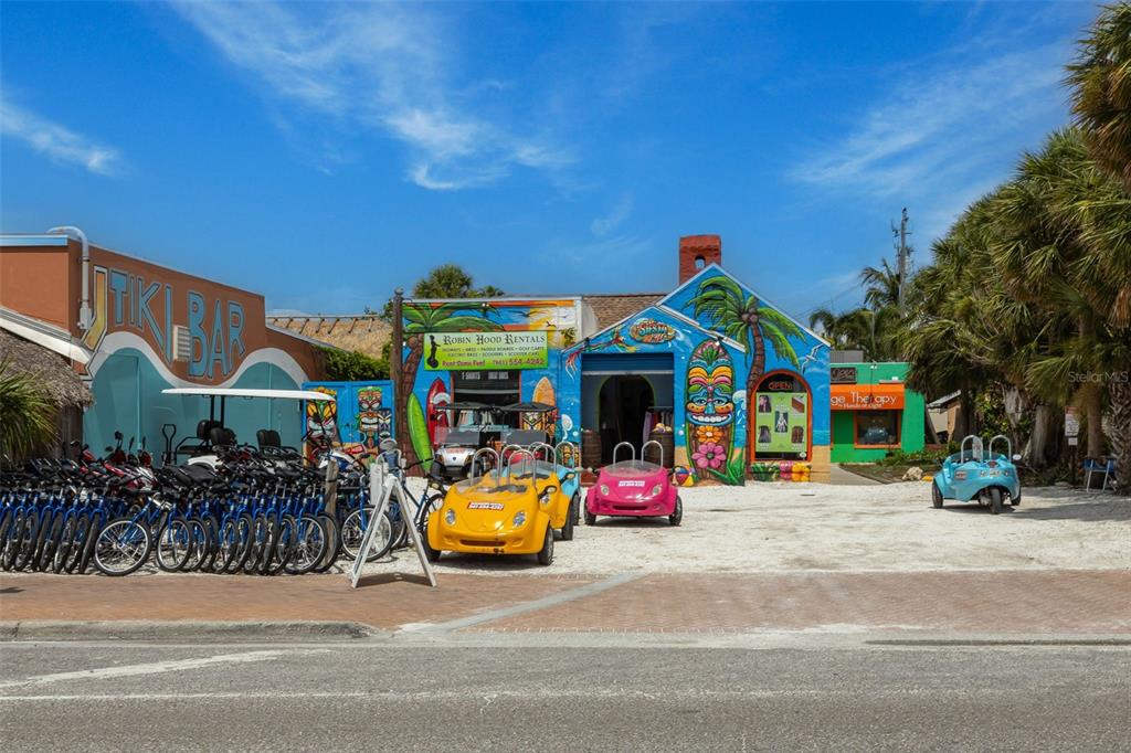 6512 Midnight Pass Road, Unit 204 Sarasota, FL 34242 - Photo 59 of 64 a childrens park with lots of swings and slides