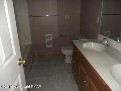 2302 Hill Road Effort, PA 18330 - Photo 3 of 9 a bathroom with a sink a toilet and shower