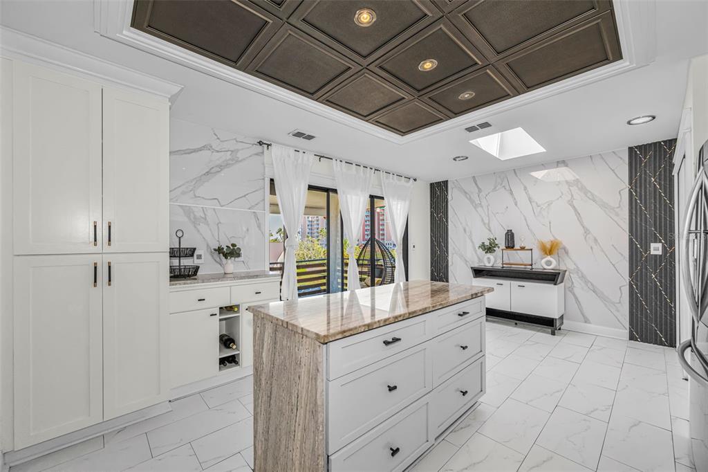 6009 Bayway Court New Port Richey, FL 34652 - Photo 19 of 93 a large white kitchen with stainless steel appliances and a refrigerator