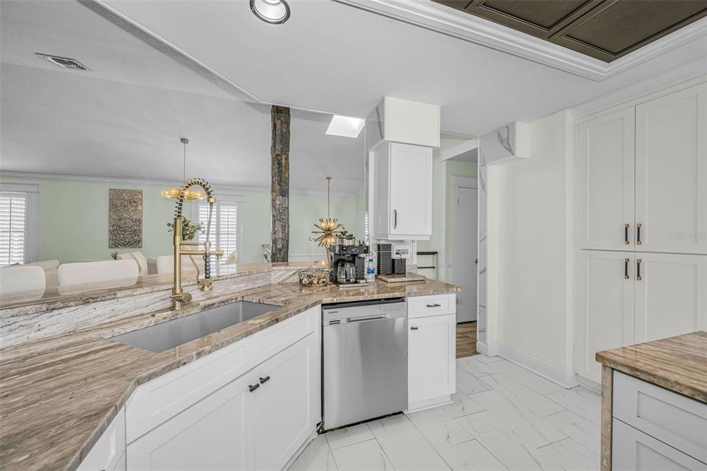 6009 Bayway Court New Port Richey, FL 34652 - Photo 20 of 93 a bathroom with a sink and a mirror