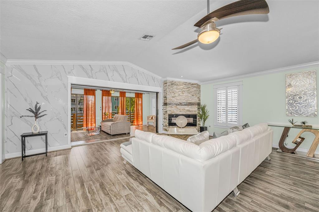 6009 Bayway Court New Port Richey, FL 34652 - Photo 32 of 93 a living room with furniture and a large window
