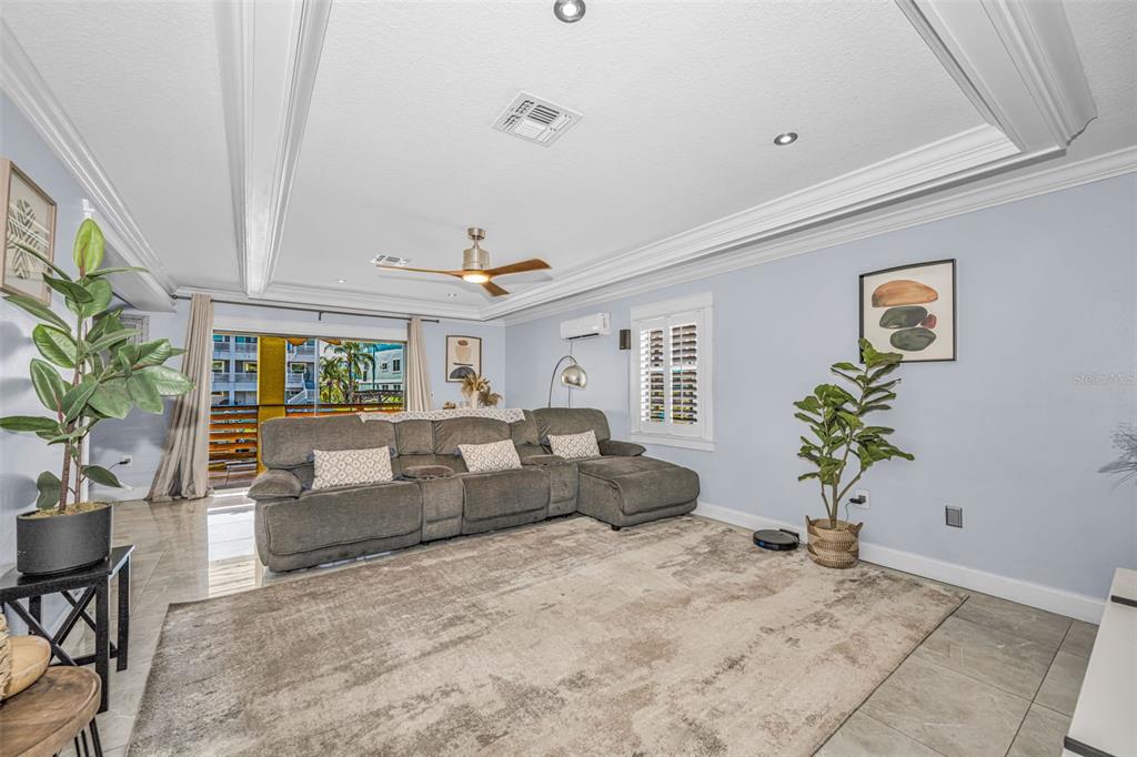 6009 Bayway Court New Port Richey, FL 34652 - Photo 49 of 93 a living room with furniture and a potted plant