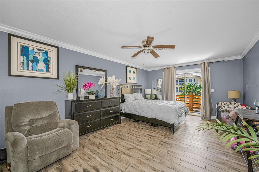 6009 Bayway Court New Port Richey, FL 34652 - Photo 55 of 93 a living room with furniture and a flat screen tv