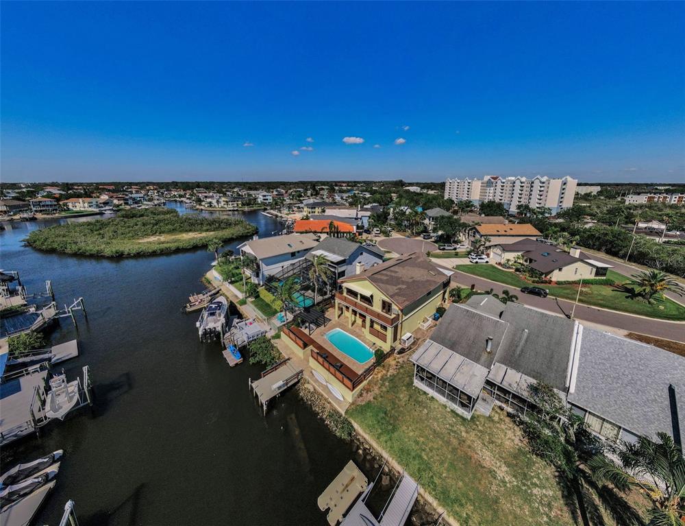 6009 Bayway Court New Port Richey, FL 34652 - Photo 73 of 93 an aerial view of a house with a lake view