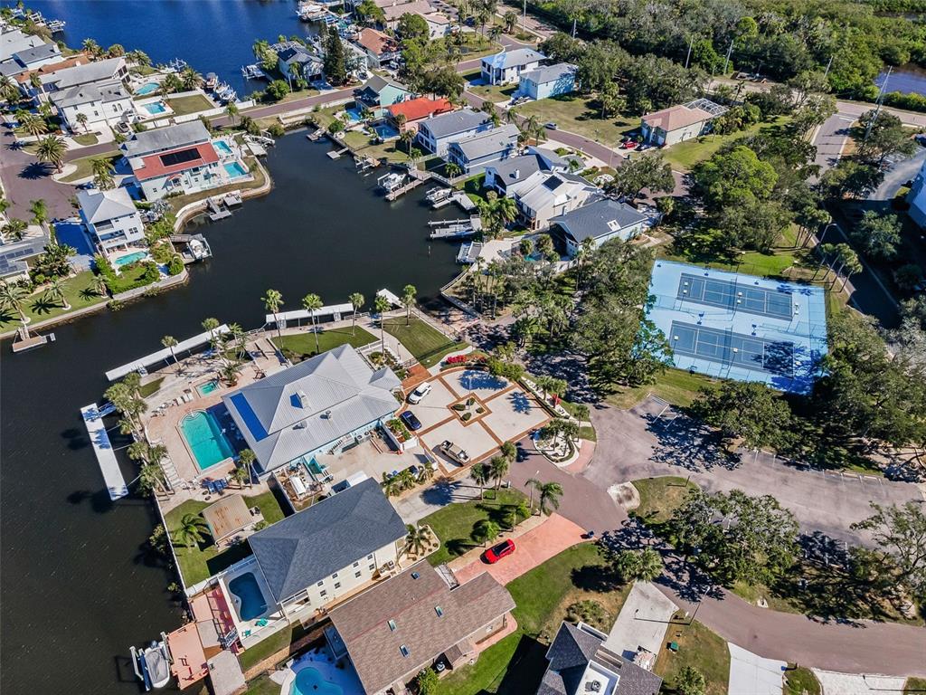 6009 Bayway Court New Port Richey, FL 34652 - Photo 91 of 93 an aerial view of a house with a lake view