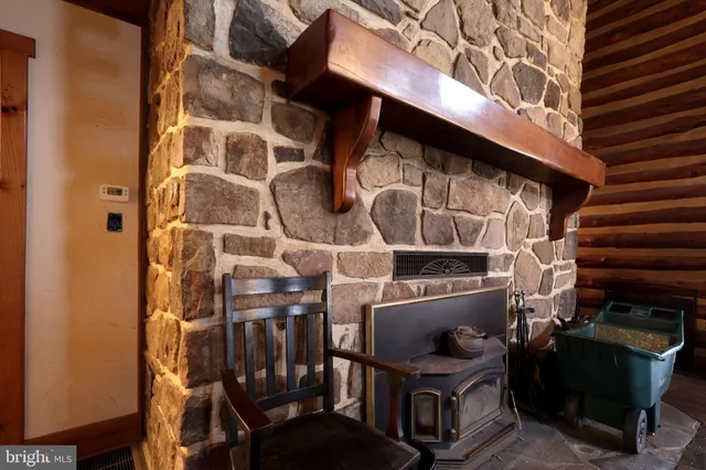 a kitchen with wooden cabinets and a sink