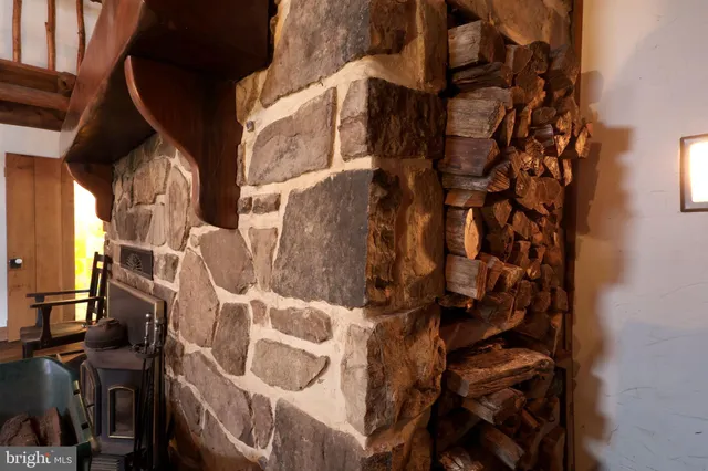 a view of a livingroom with furniture and hardwood floor