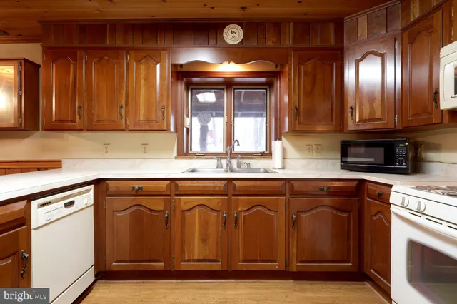 a bathroom with a toilet and shower