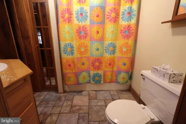 a bed room with furniture and a window