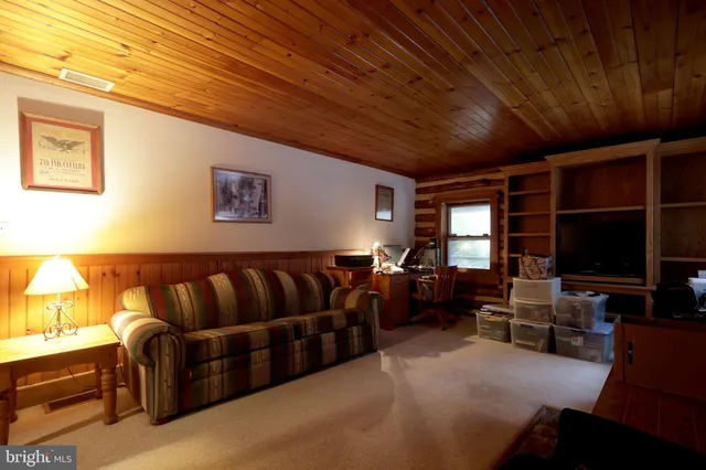 a view of a balcony with wooden floor