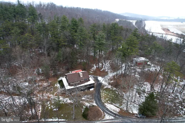 a view of a balcony with wooden floor