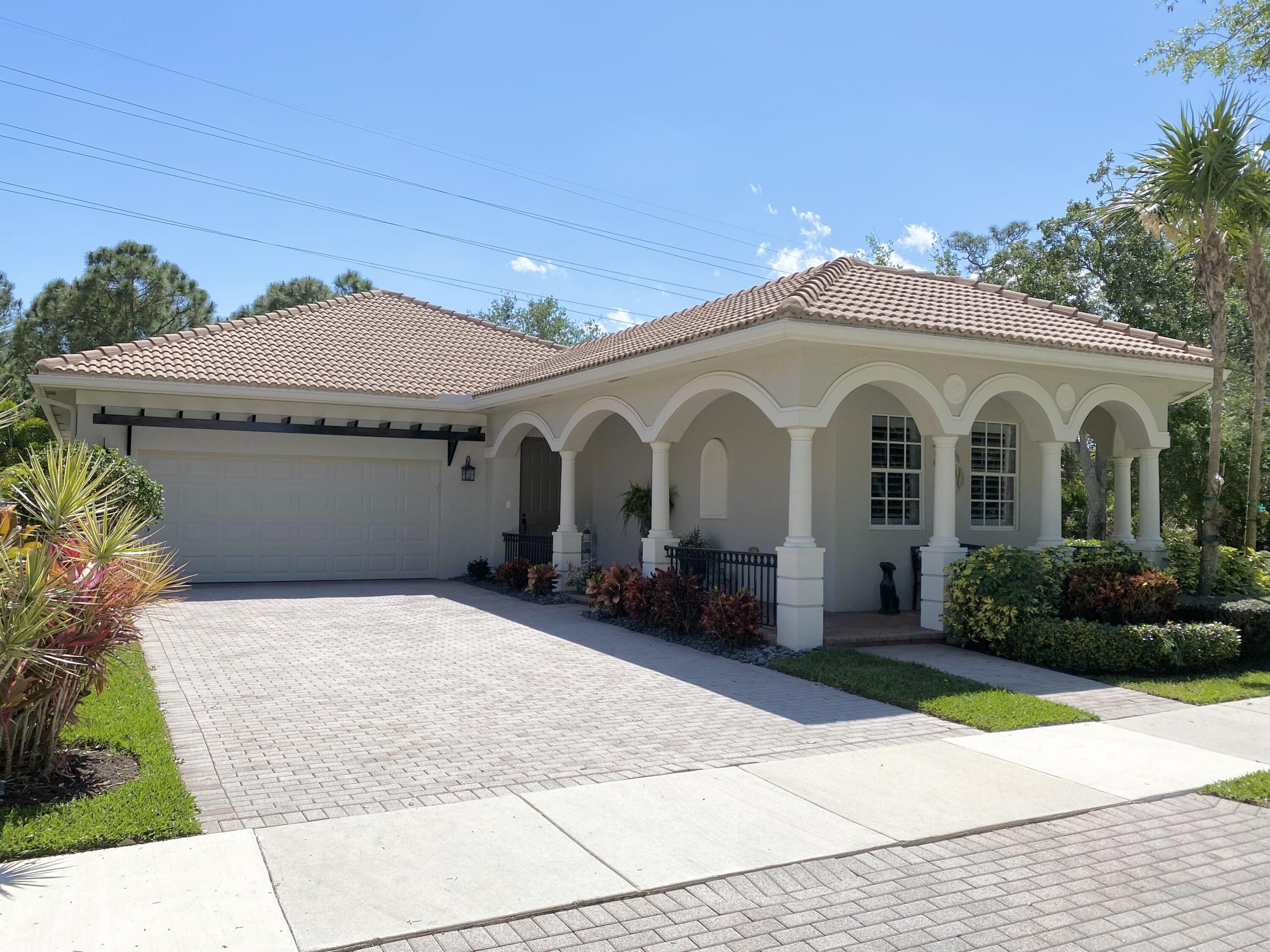 102 Via Castilla Jupiter, FL 33458 - Photo 1 of 19 Front