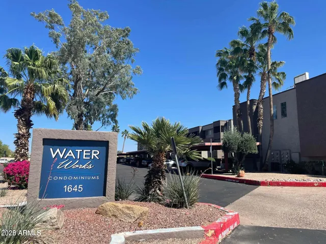 a sign that is on the side of a building