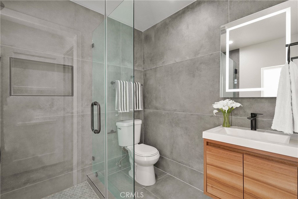 775 Morada Place Altadena, CA 91001 - Photo 14 of 24 a bathroom with a toilet shower and sink