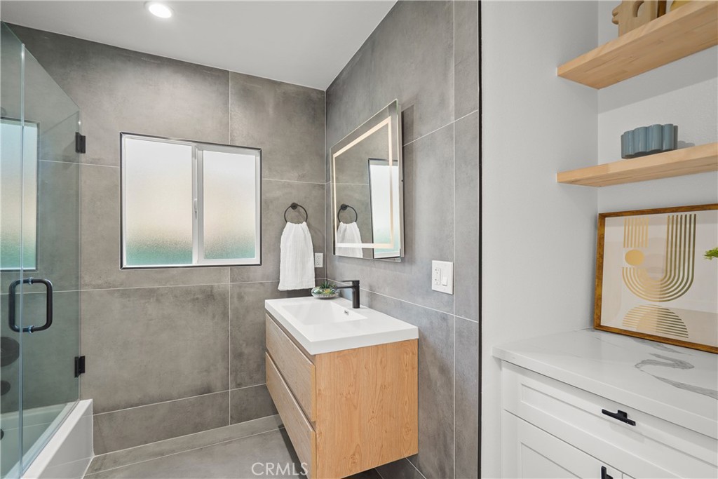 775 Morada Place Altadena, CA 91001 - Photo 18 of 24 a bathroom with a sink and a mirror