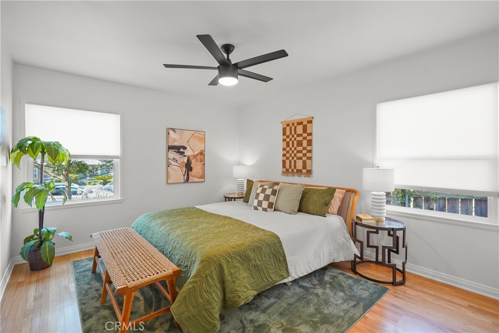 775 Morada Place Altadena, CA 91001 - Photo 19 of 24 a bed sitting in a bedroom next to a window