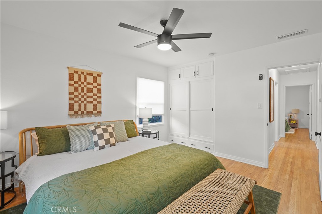 775 Morada Place Altadena, CA 91001 - Photo 20 of 24 a bedroom with a bed and a couch