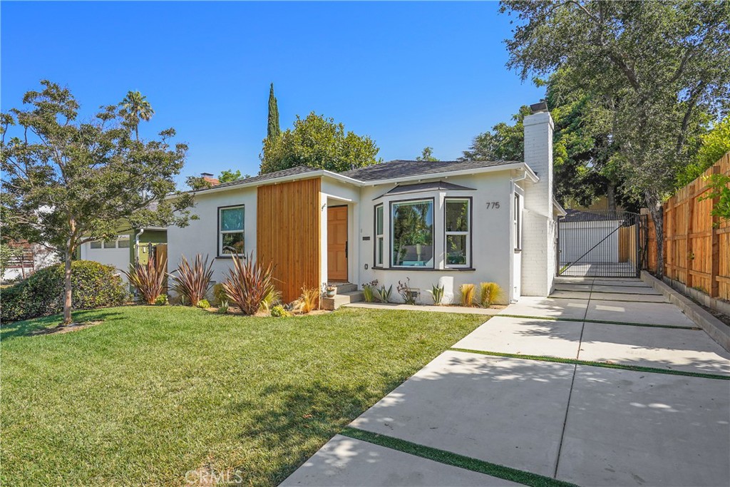 775 Morada Place Altadena, CA 91001 - Photo 2 of 24 a front view of a house with a yard