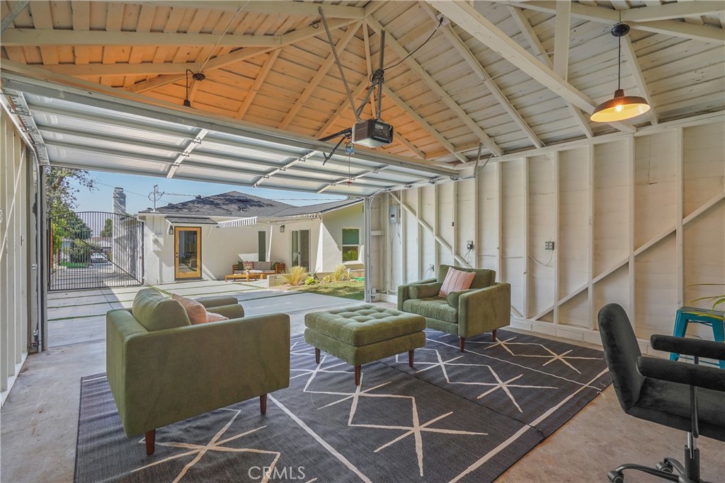 775 Morada Place Altadena, CA 91001 - Photo 23 of 24 a living room with furniture and a chandelier