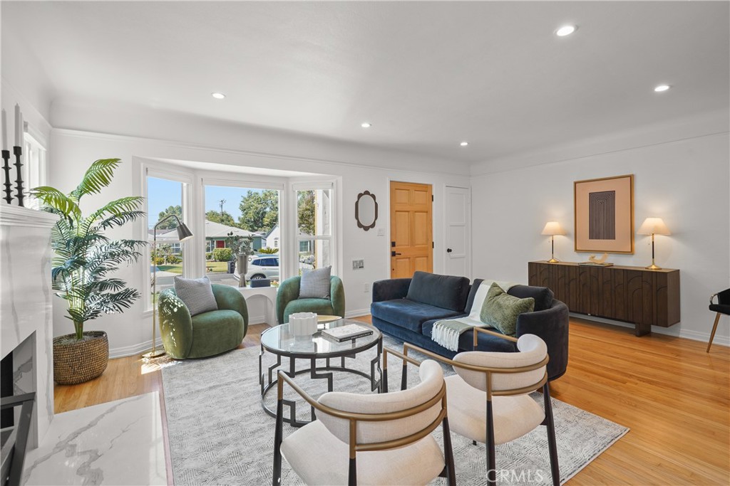 775 Morada Place Altadena, CA 91001 - Photo 3 of 24 a living room with furniture potted plant and a window