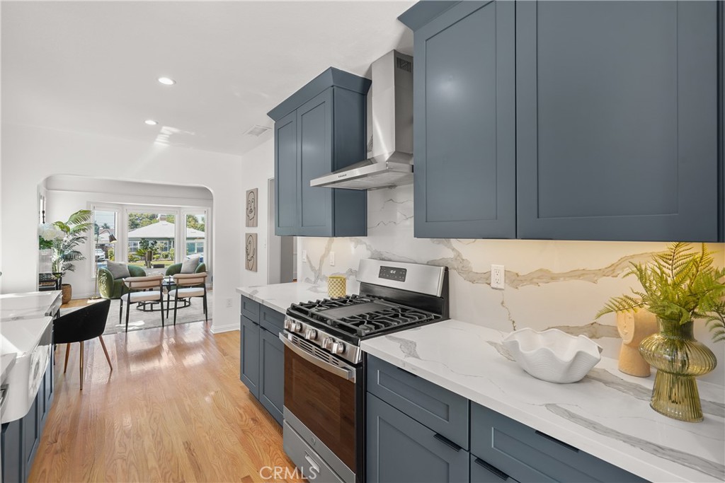 775 Morada Place Altadena, CA 91001 - Photo 8 of 24 a kitchen with sink and stove top oven
