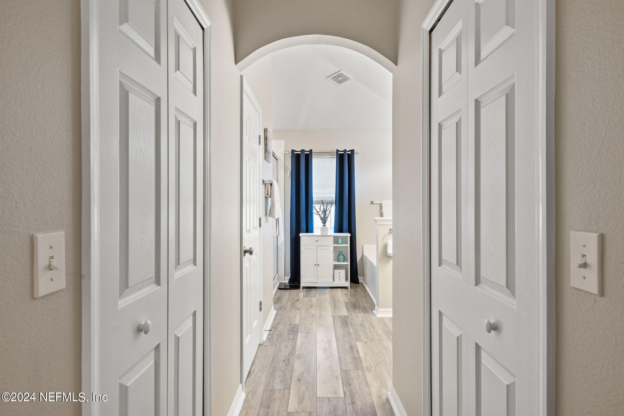 18 Underwick Path Palm Coast, FL 32164 - Photo 13 of 36 a view of a hallway with wooden floor and entryway