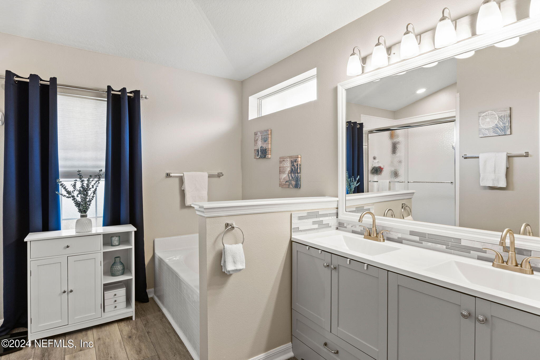 18 Underwick Path Palm Coast, FL 32164 - Photo 14 of 36 a bathroom with a double vanity sink mirror and