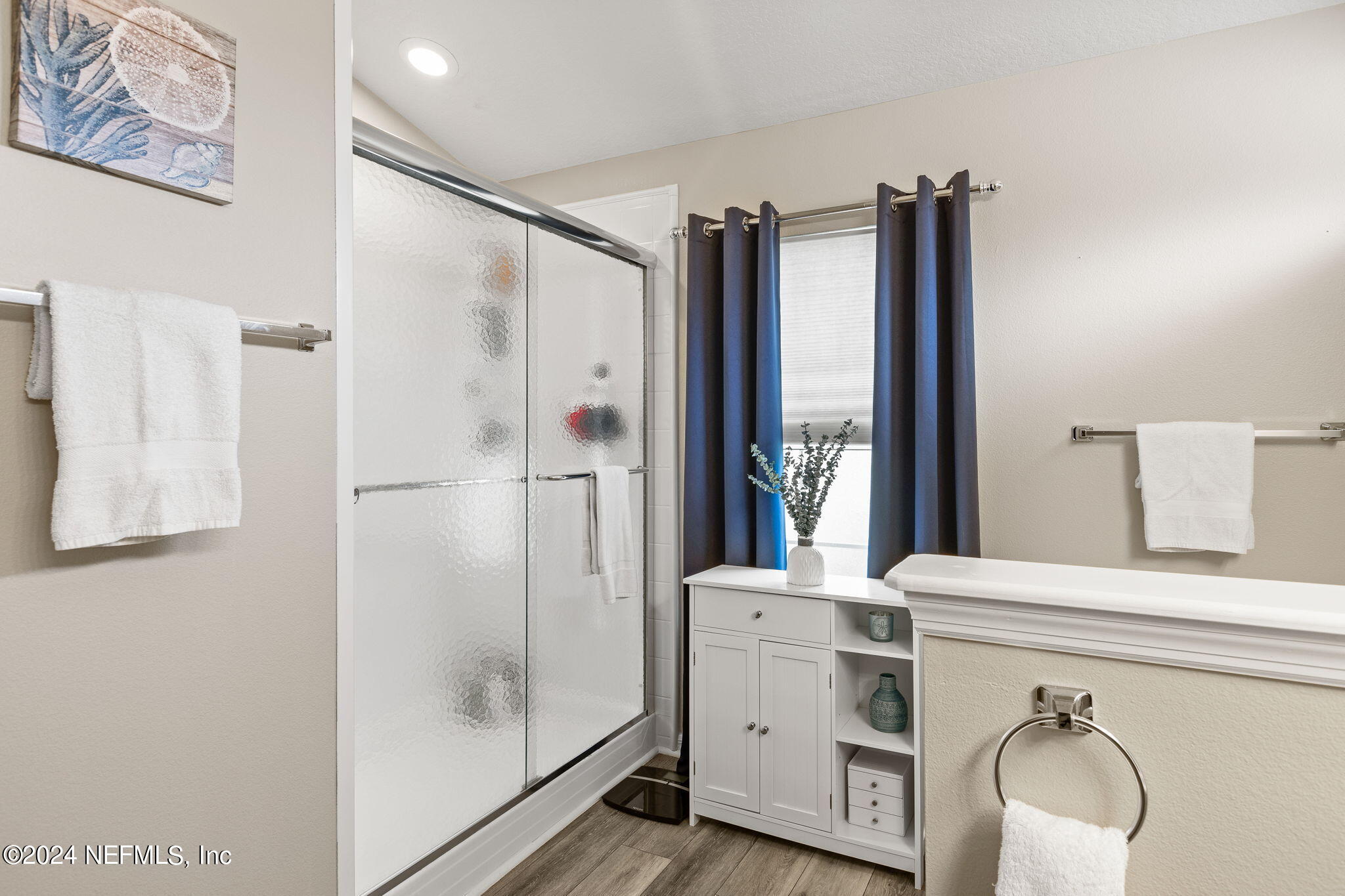 18 Underwick Path Palm Coast, FL 32164 - Photo 15 of 36 a bathroom with a bathtub and a shower