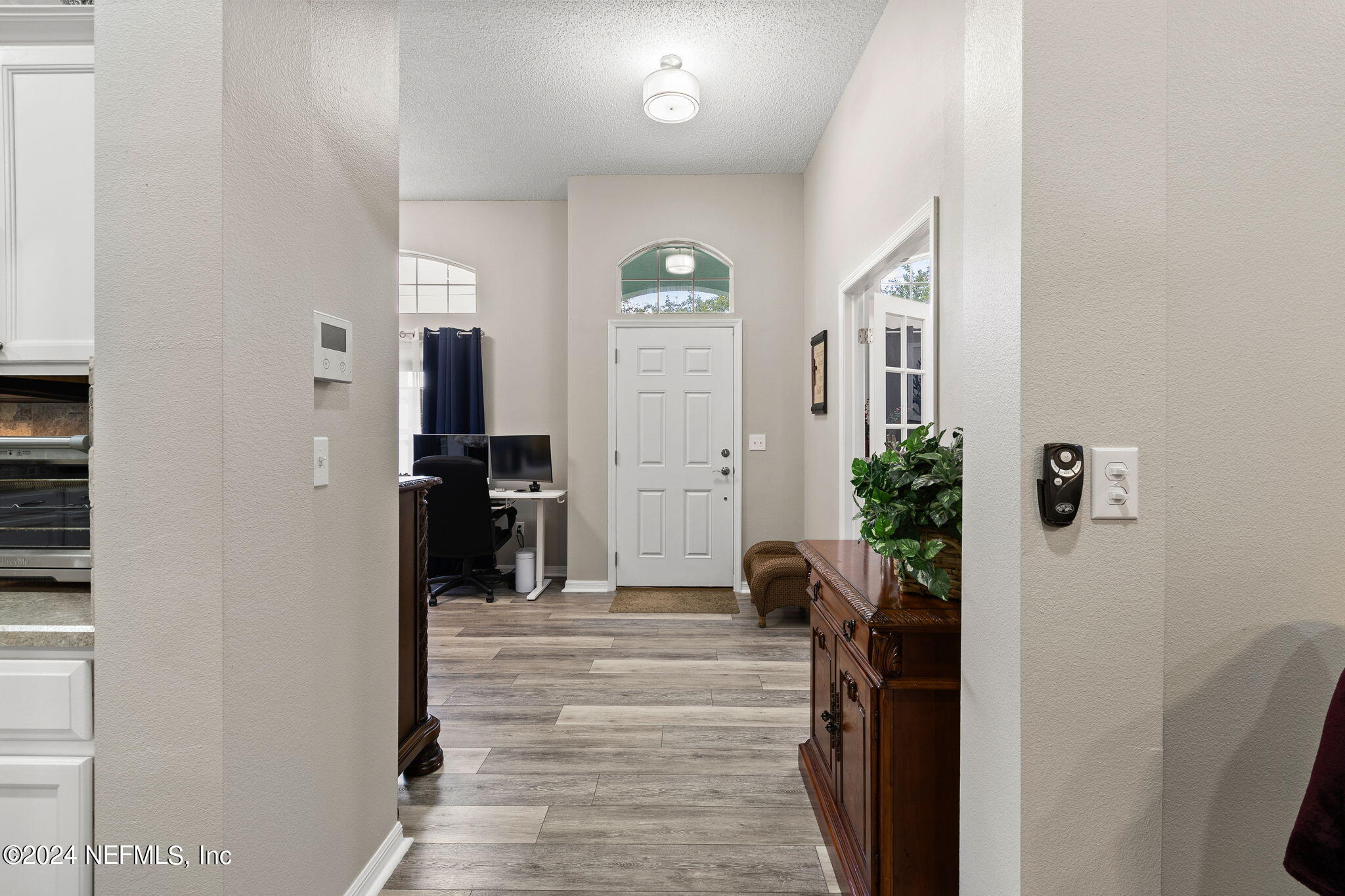 18 Underwick Path Palm Coast, FL 32164 - Photo 21 of 36 a view of entryway with livingroom and furniture