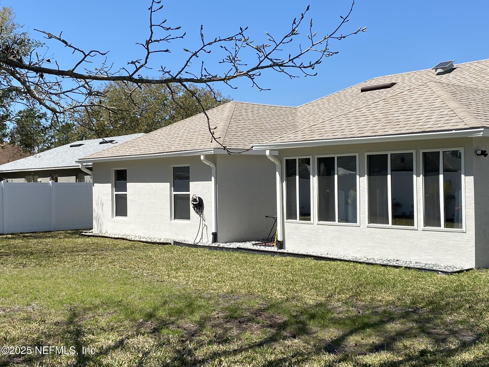 18 Underwick Path Palm Coast, FL 32164 - Photo 29 of 36 a view of a house with a garden