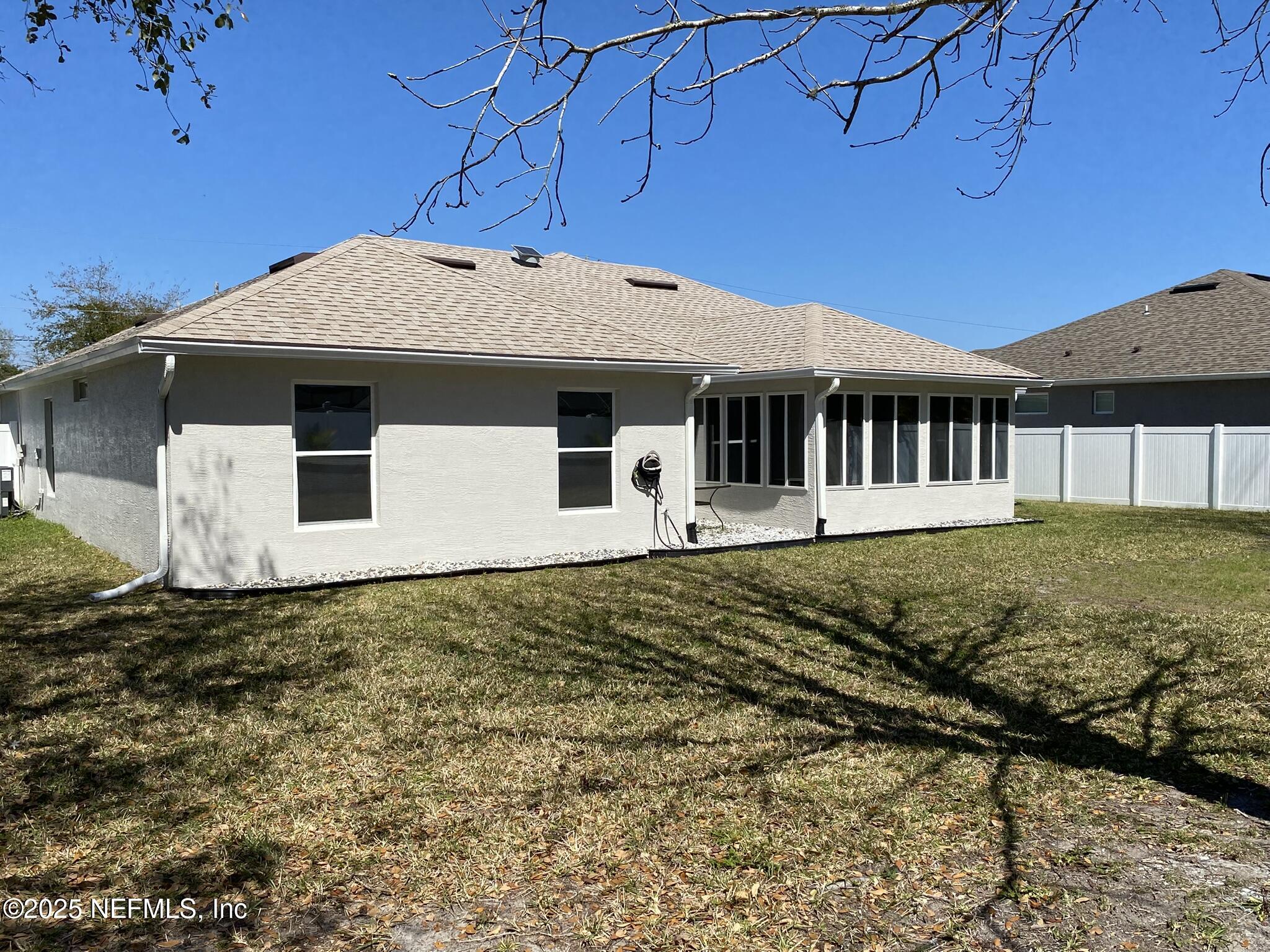 18 Underwick Path Palm Coast, FL 32164 - Photo 31 of 36 a front view of a house with a yard