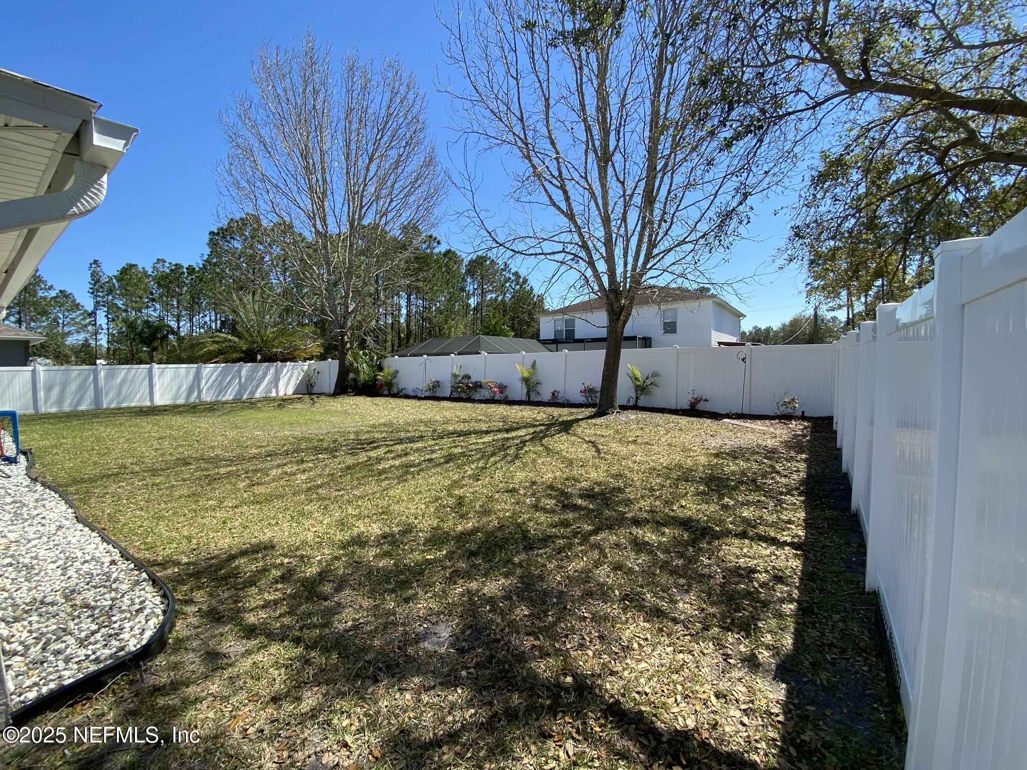 18 Underwick Path Palm Coast, FL 32164 - Photo 32 of 36 a view of swimming pool with a yard