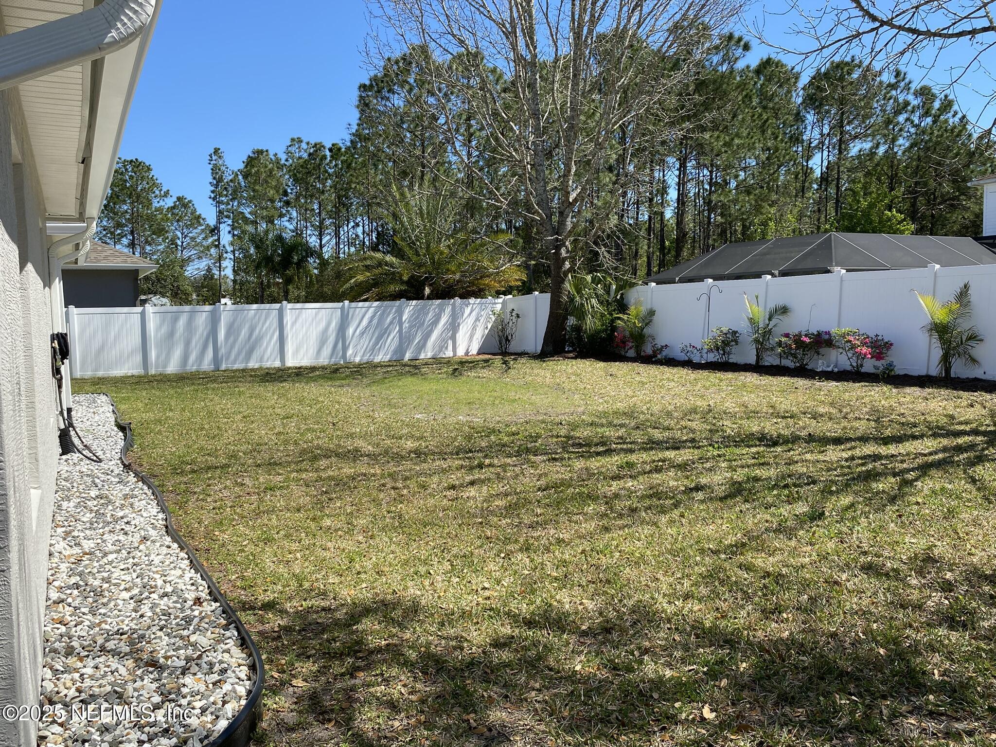 18 Underwick Path Palm Coast, FL 32164 - Photo 35 of 36 a view of a back yard with an outdoor space