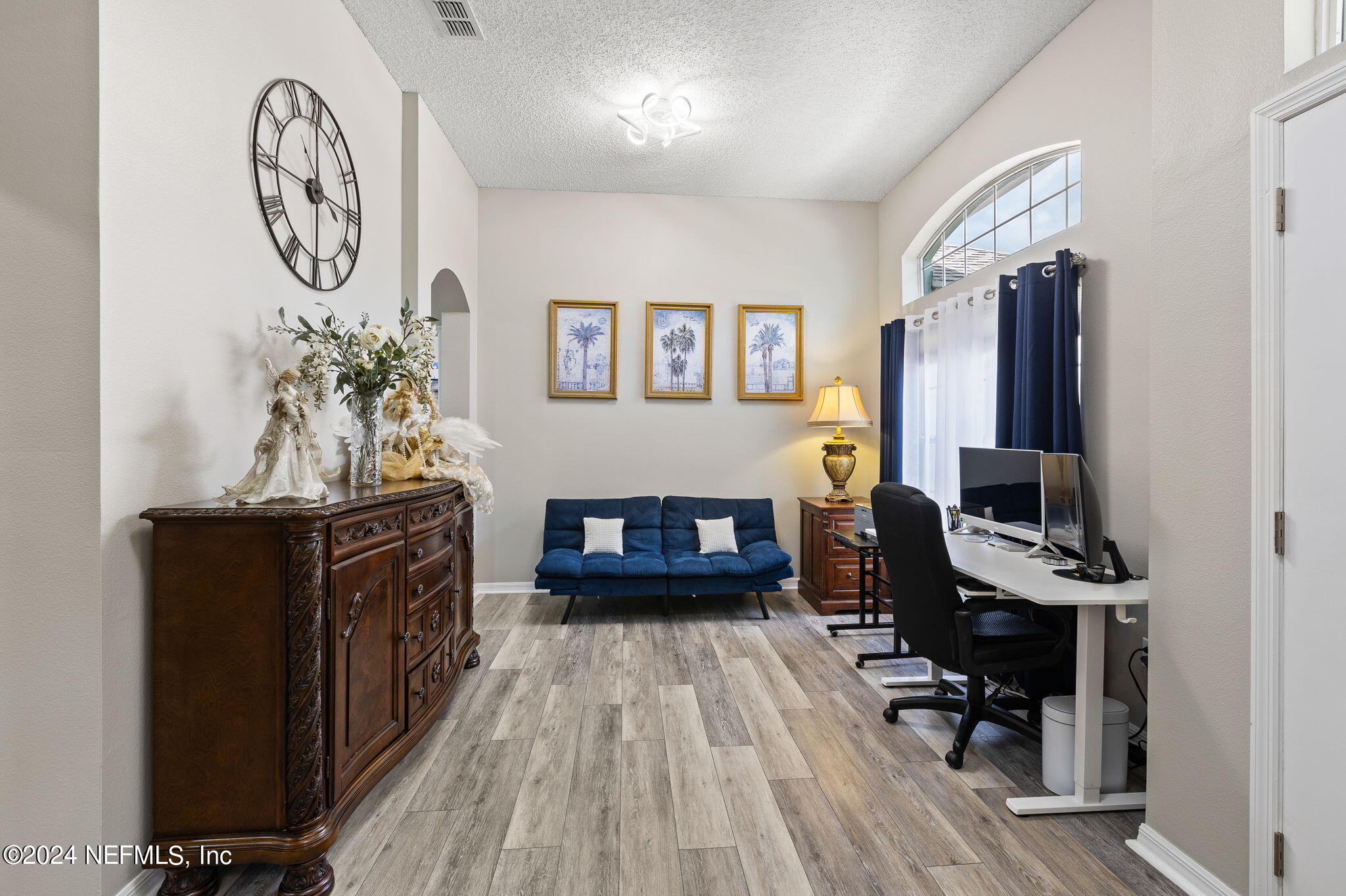 18 Underwick Path Palm Coast, FL 32164 - Photo 4 of 36 a view of living room with furniture and wooden floor