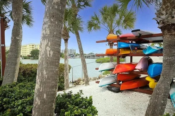a view of a pathway with a wrought iron stairs