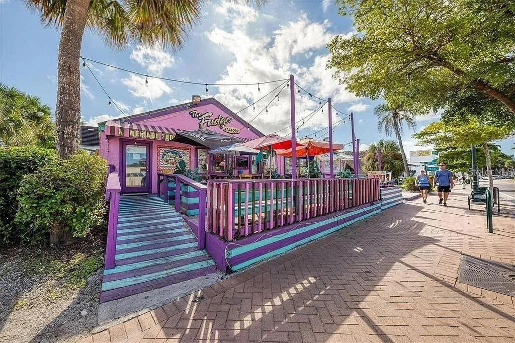 1650 Stickney Point Road, Unit 50202 Sarasota, FL 34231 - Photo 36 of 46 a view of a pathway with a wrought iron stairs