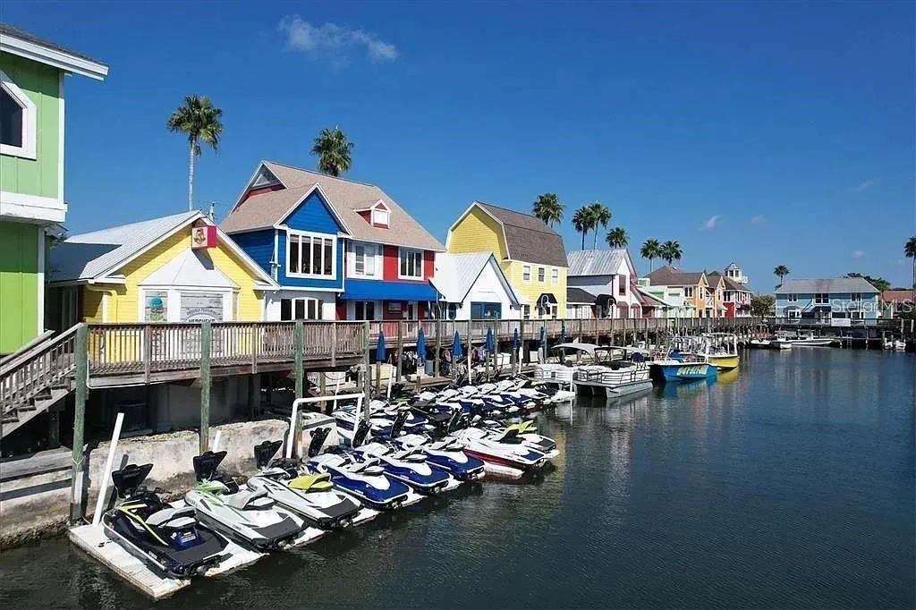 1650 Stickney Point Road, Unit 50202 Sarasota, FL 34231 - Photo 37 of 46 a view of a lake with boats