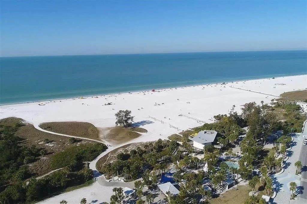 1650 Stickney Point Road, Unit 50202 Sarasota, FL 34231 - Photo 40 of 46 a view of beach and ocean