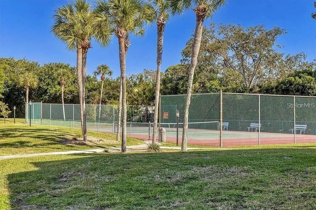 1650 Stickney Point Road, Unit 50202 Sarasota, FL 34231 - Photo 42 of 46 a view of a park with a slide