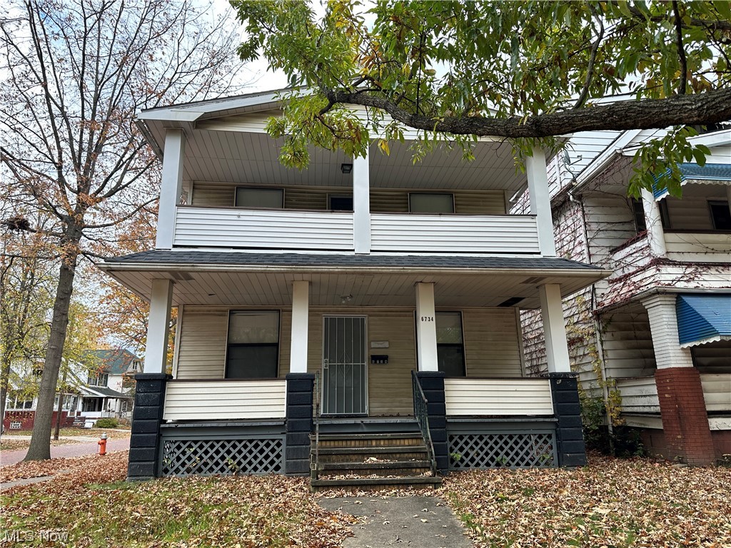6734 Ottawa Road Cleveland, OH 44105 - Photo 1 of 31 View of front of house with a balcony and covered porch