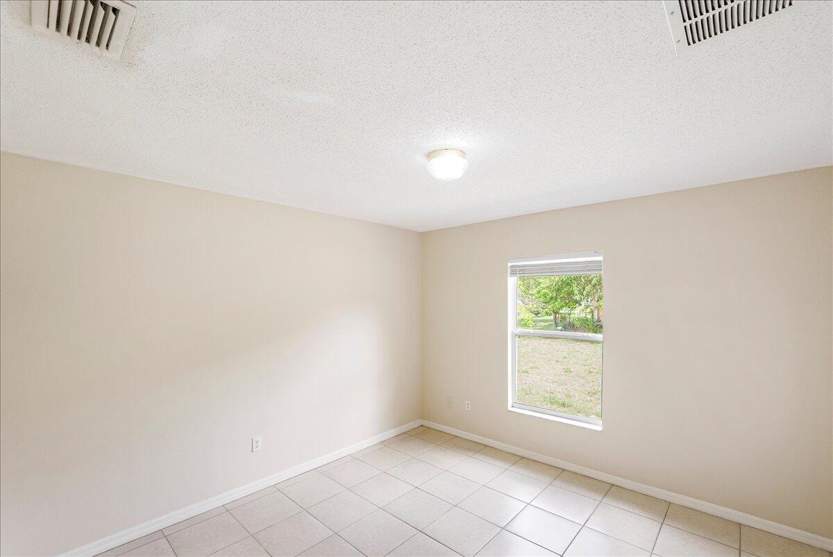 291 Southwest Covington Road Port St. Lucie, FL 34953 - Photo 9 of 27 02-DSC5392