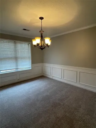 a view of a livingroom with a chandelier