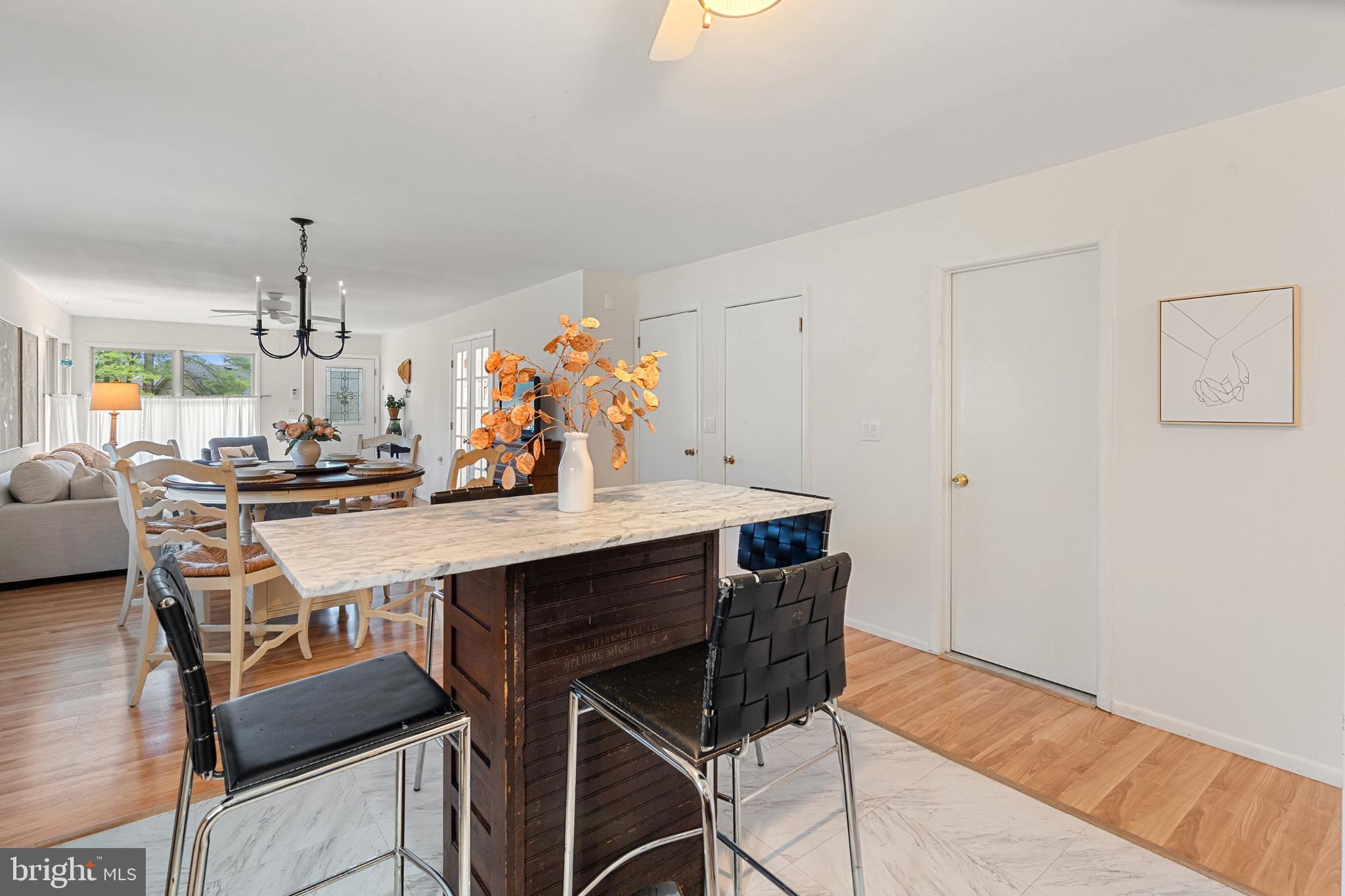 2B Magnolia Road Manahawkin, NJ 08050 - Photo 14 of 37 a view of a dining room with furniture and chandelier