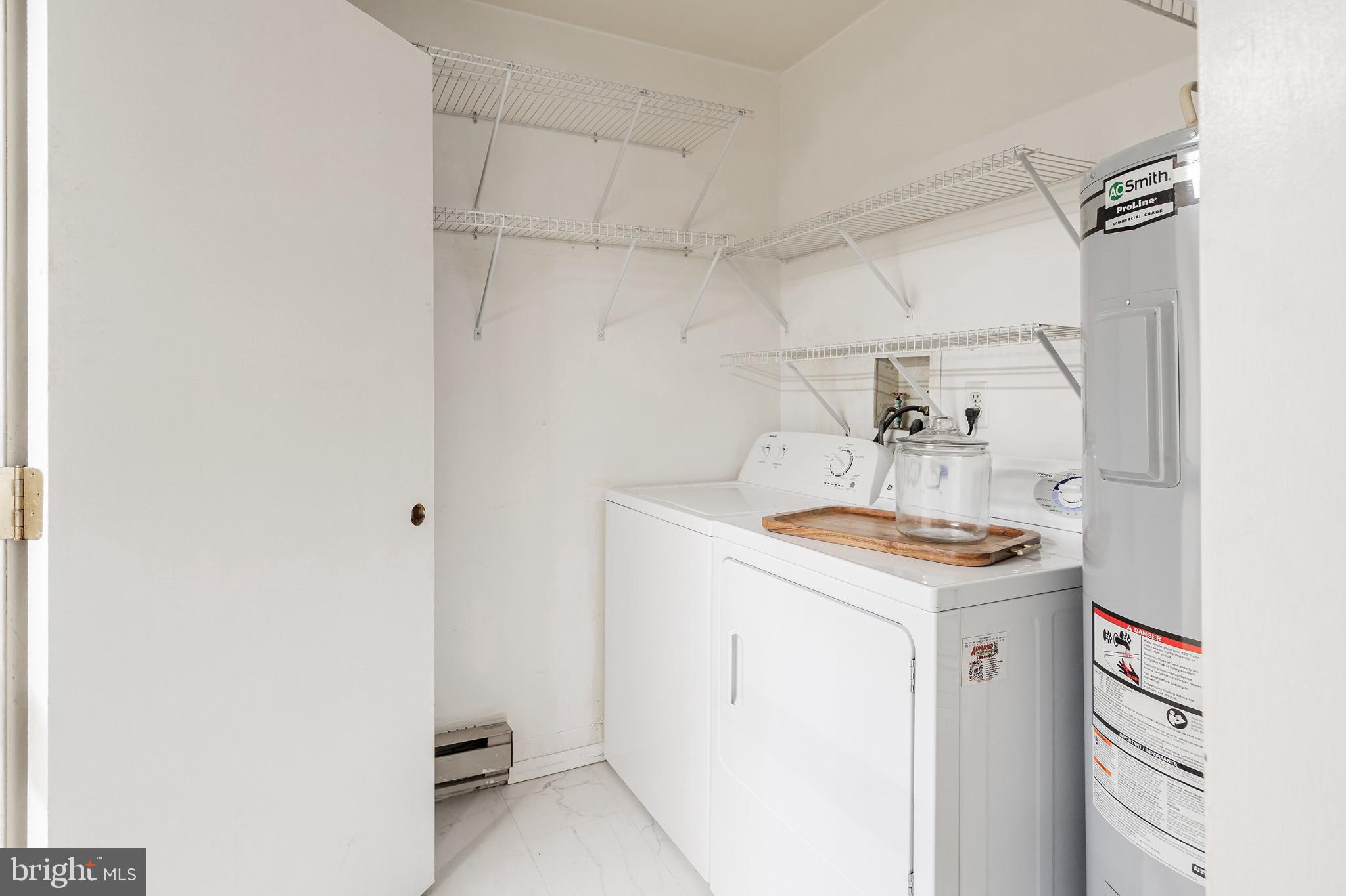 2B Magnolia Road Manahawkin, NJ 08050 - Photo 23 of 37 a utility room with dryer and washer