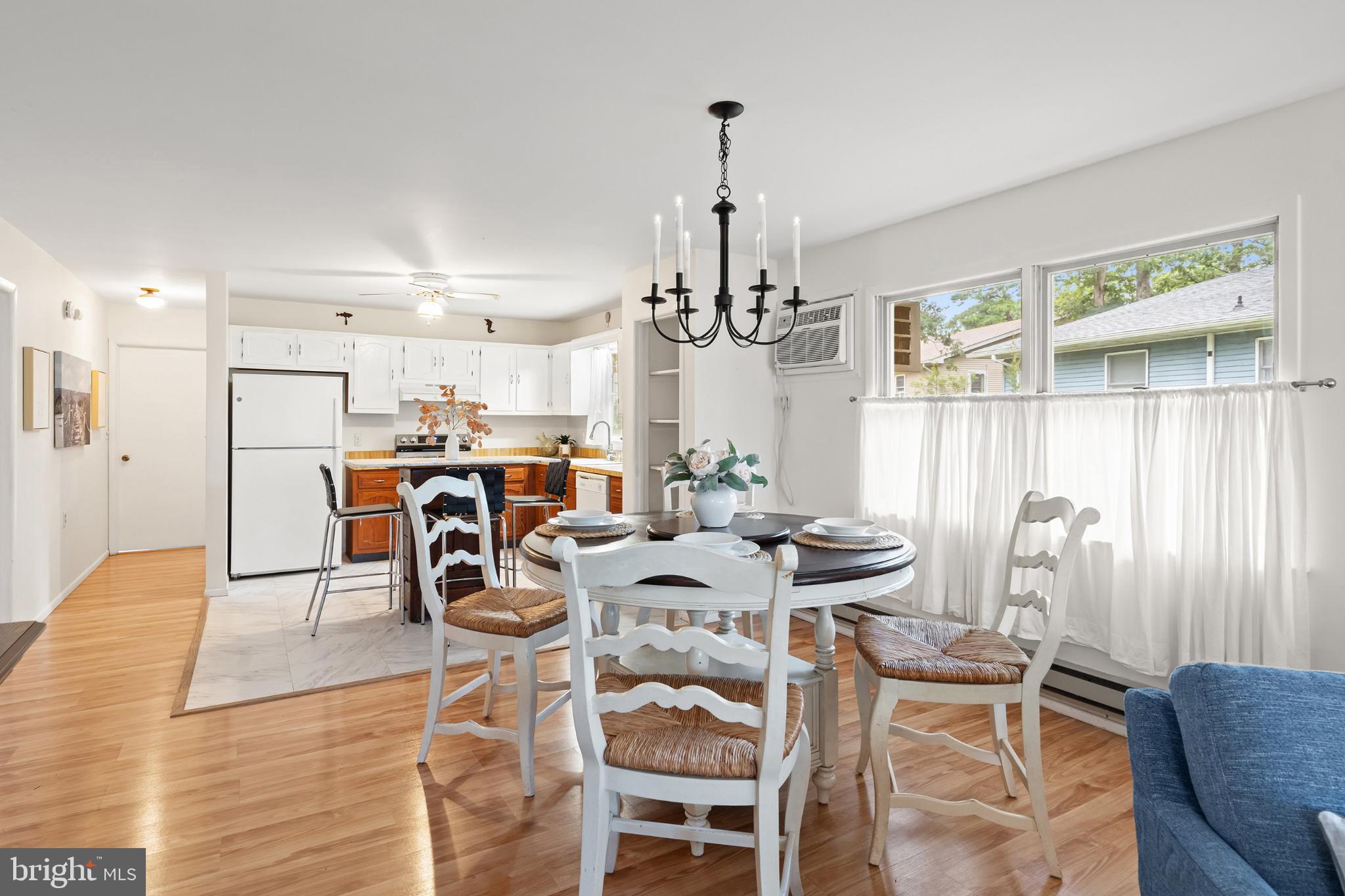 2B Magnolia Road Manahawkin, NJ 08050 - Photo 10 of 37 a view of a dining room with furniture window and outside view