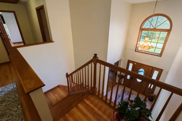a view of entryway with wooden floor