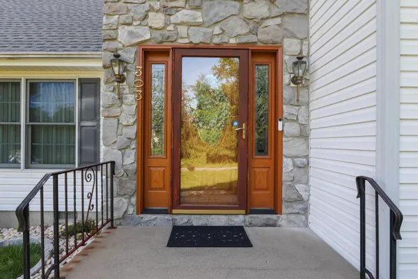 a view of a entryway door front of house