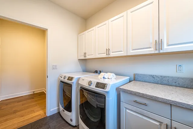 a utility room with dryer and washer